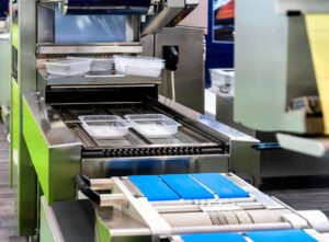 Trays on a food processing line
